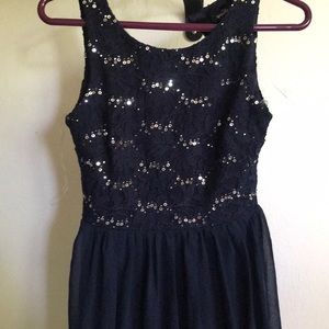 A dark blue dress with sequins
